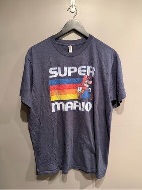 Nintendo Super Mario Navy Tee with Retro Rainbow Stripes